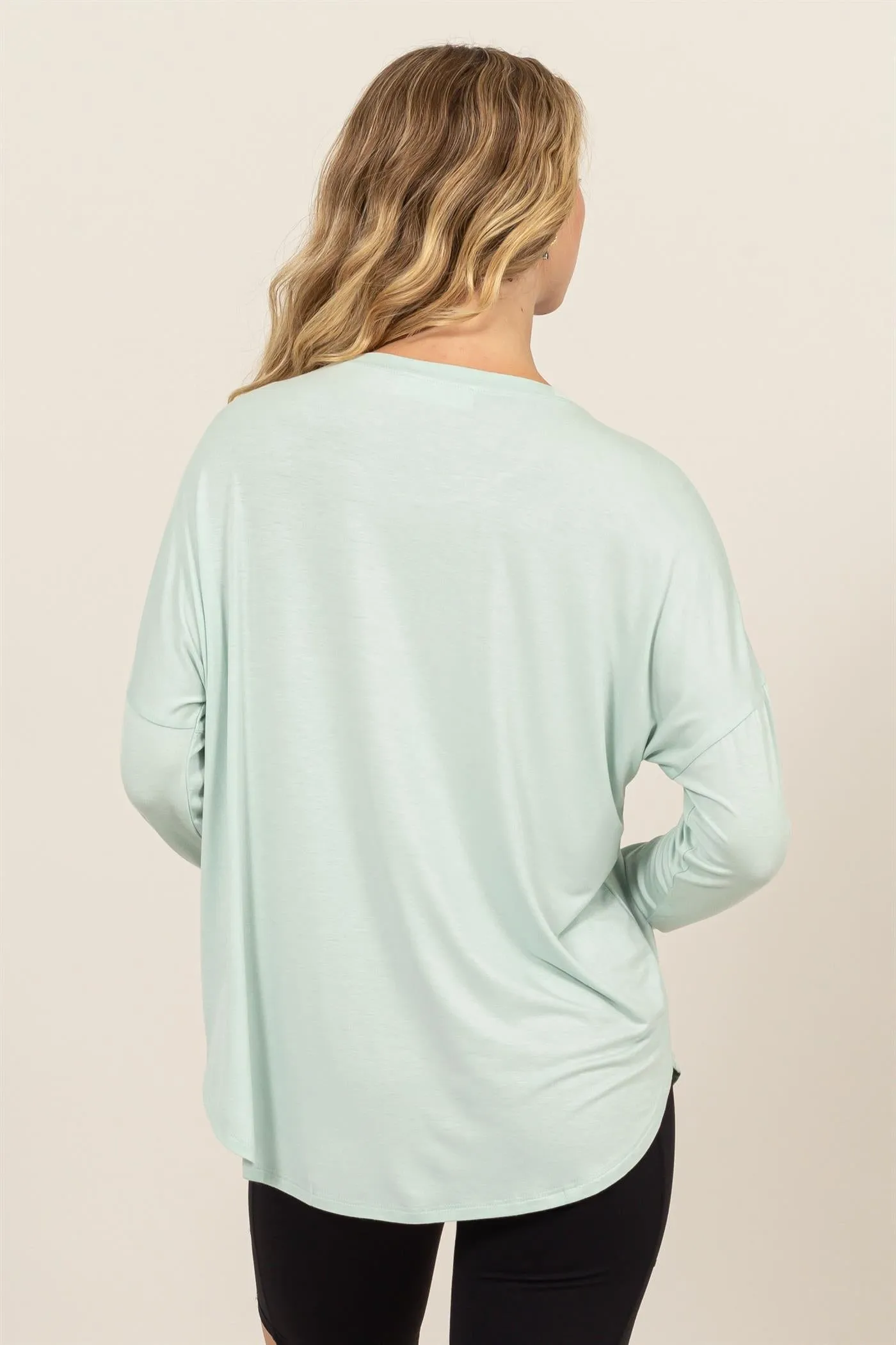 DZ24F349-Round Neck Long Sleeve Curved Hem Top